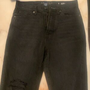 I am selling these cute distressed boot cut black jeans!